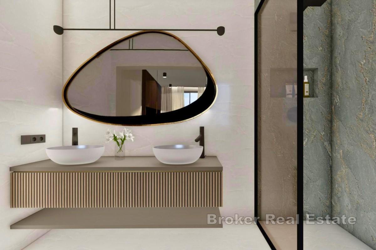 Appartement exclusif au rez-de-chaussée avec jardin et piscine