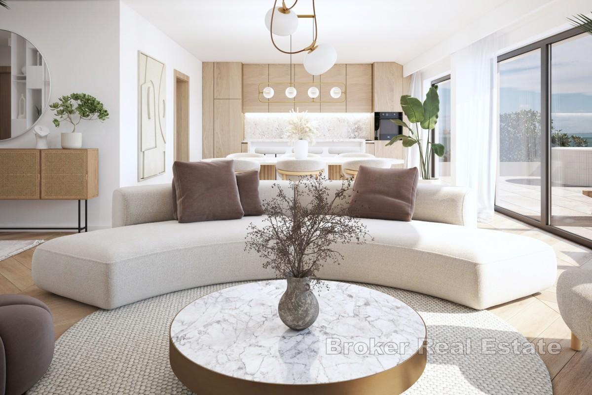 Appartement exclusif de trois chambres au rez-de-chaussée avec terrasse