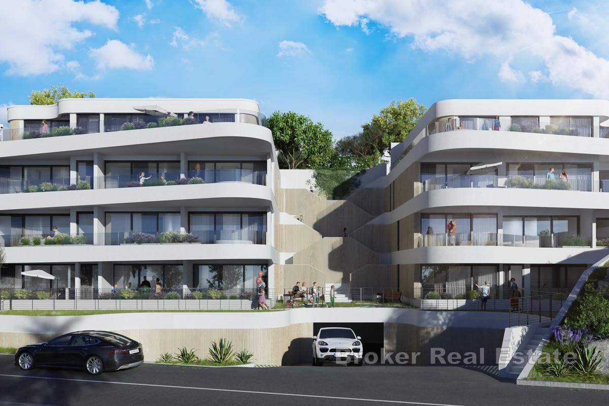 Appartement exclusif de trois chambres au rez-de-chaussée avec terrasse