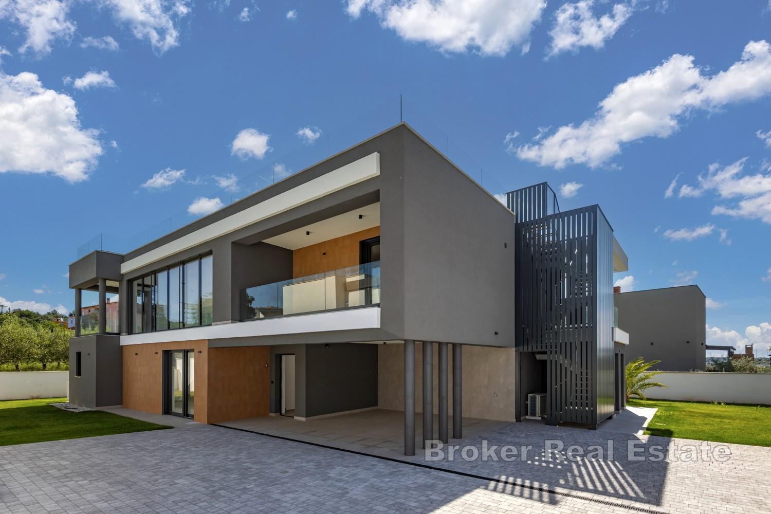 Exklusive Wohnvilla am Meer mit privater Dachterrasse