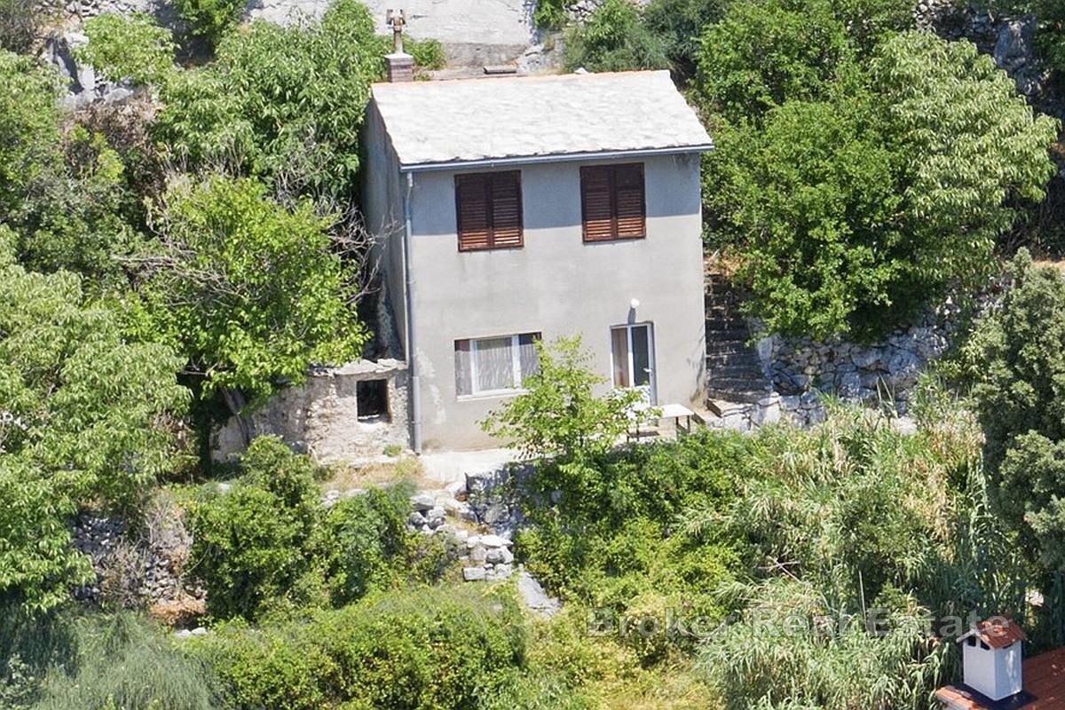 Renovierungsbedürftiges Haus mit Meer- und Inselblick