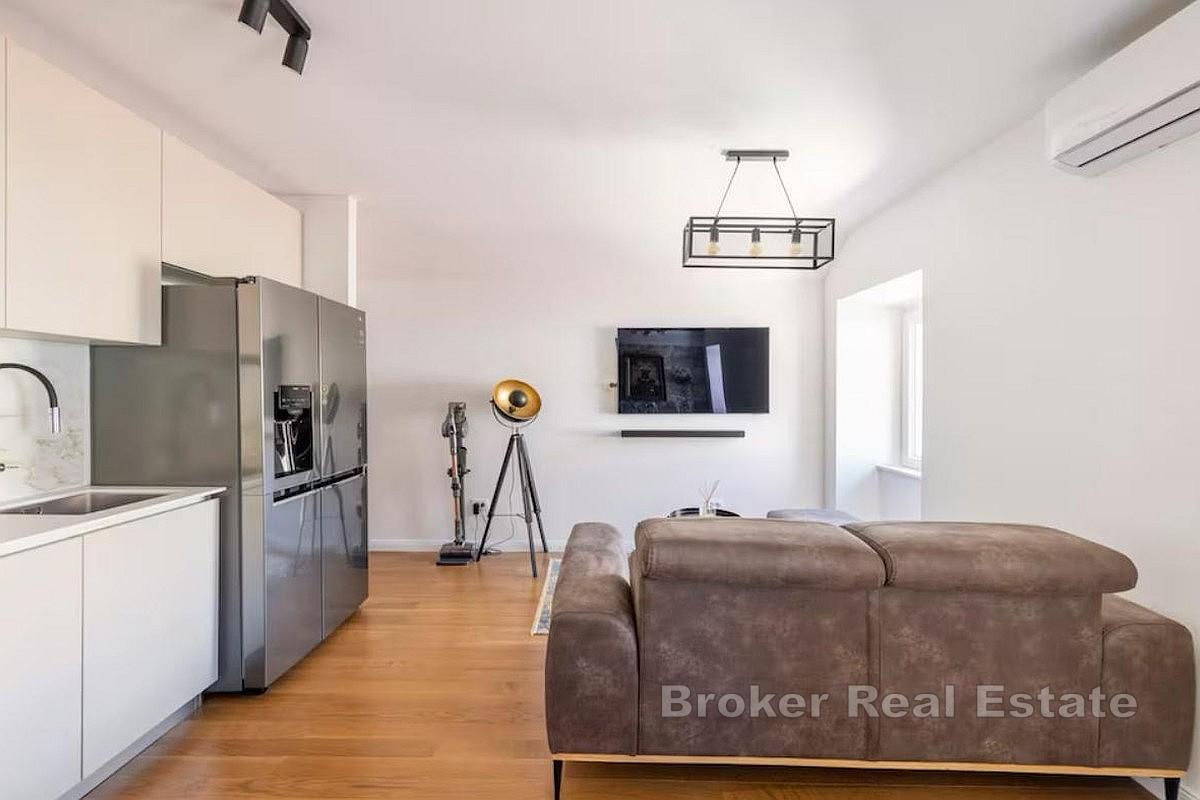 Totalrenovert toroms leilighet med en studioleilighet i sentrum - utmerket for bolig eller investering