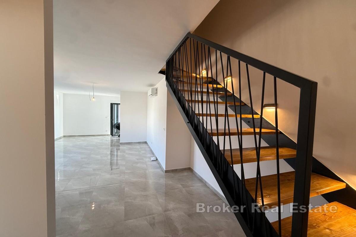 Appartamento duplex con posto auto in garage