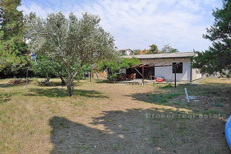 Near Zadar. Seafront land with a house