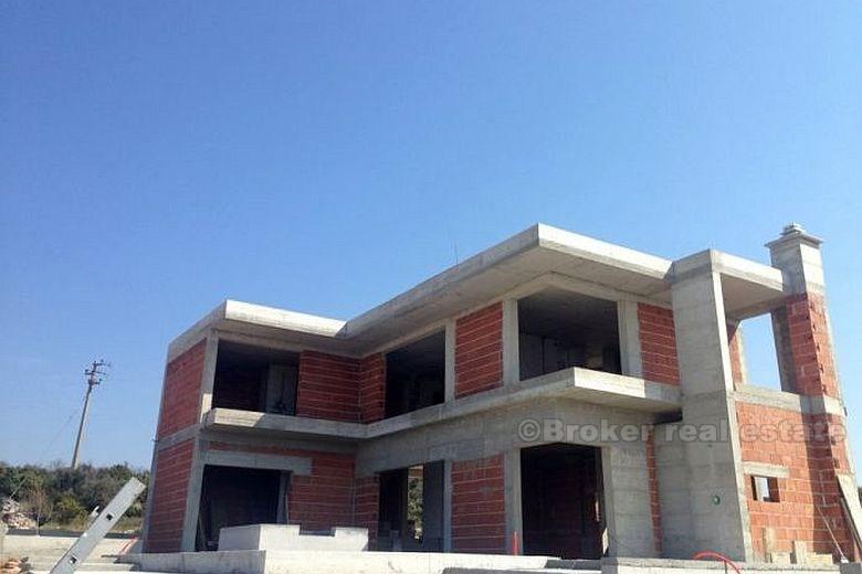 Sten, villa under bygging