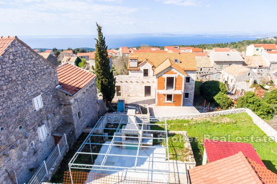 Øya Hvar - Stone hus i en rad med havutsikt