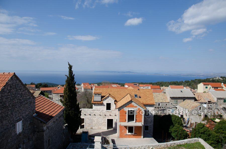 Øya Hvar - Stone hus i en rad med havutsikt