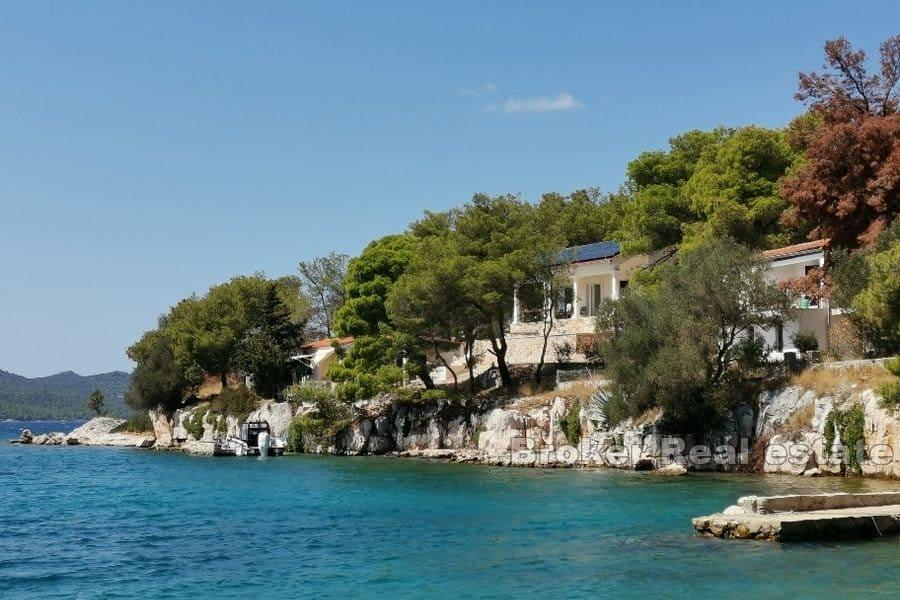 Three properties in the first row to the sea