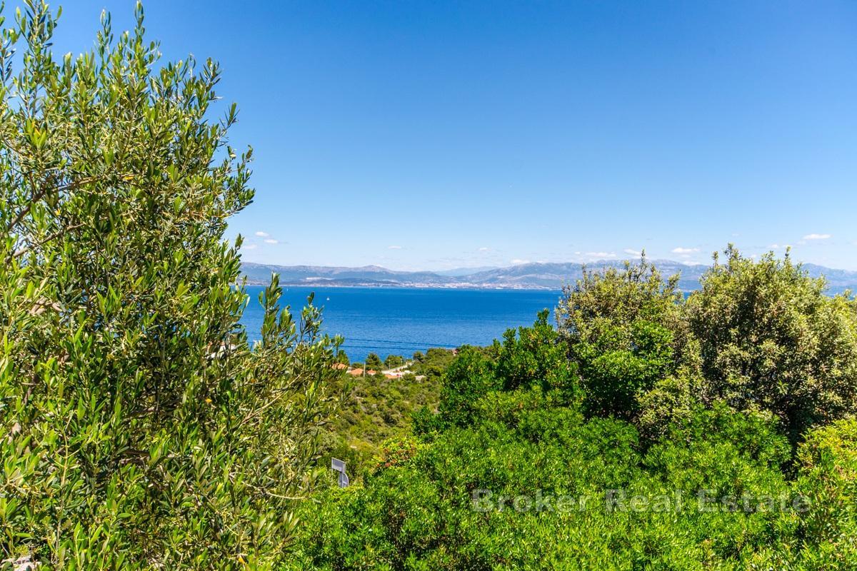 Građevinska parcela s projektom kuće