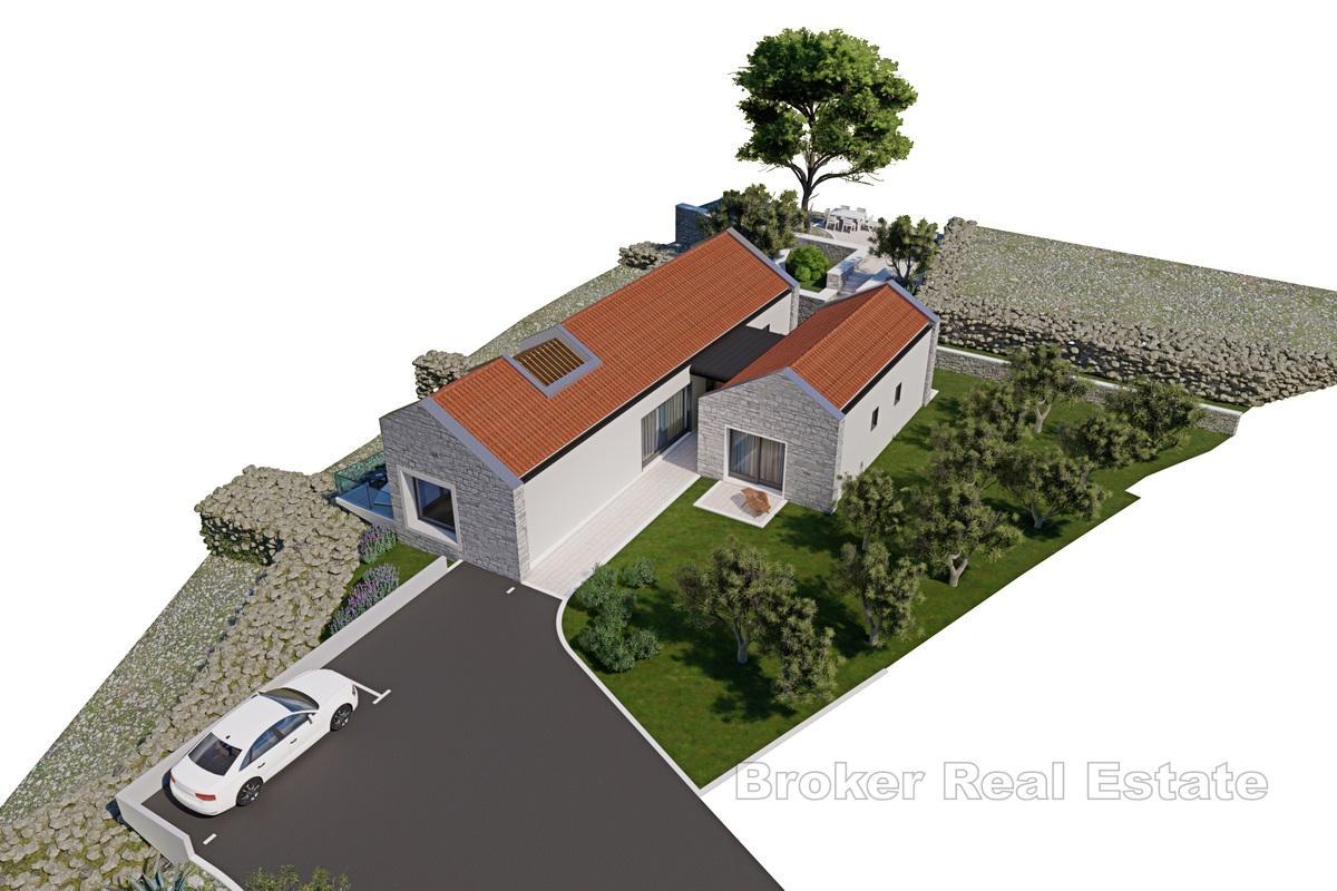 Građevinska parcela s projektom kuće