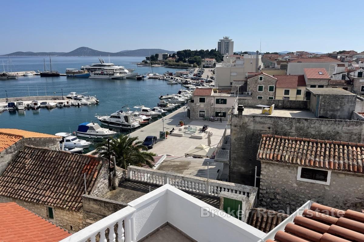 Дом с семью квартирами в центре