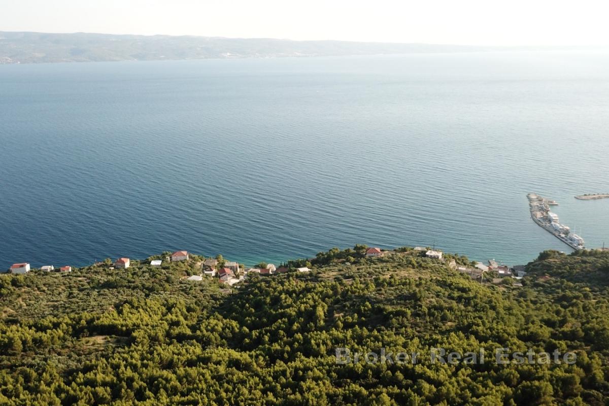 Tomt med panoramautsikt över havet