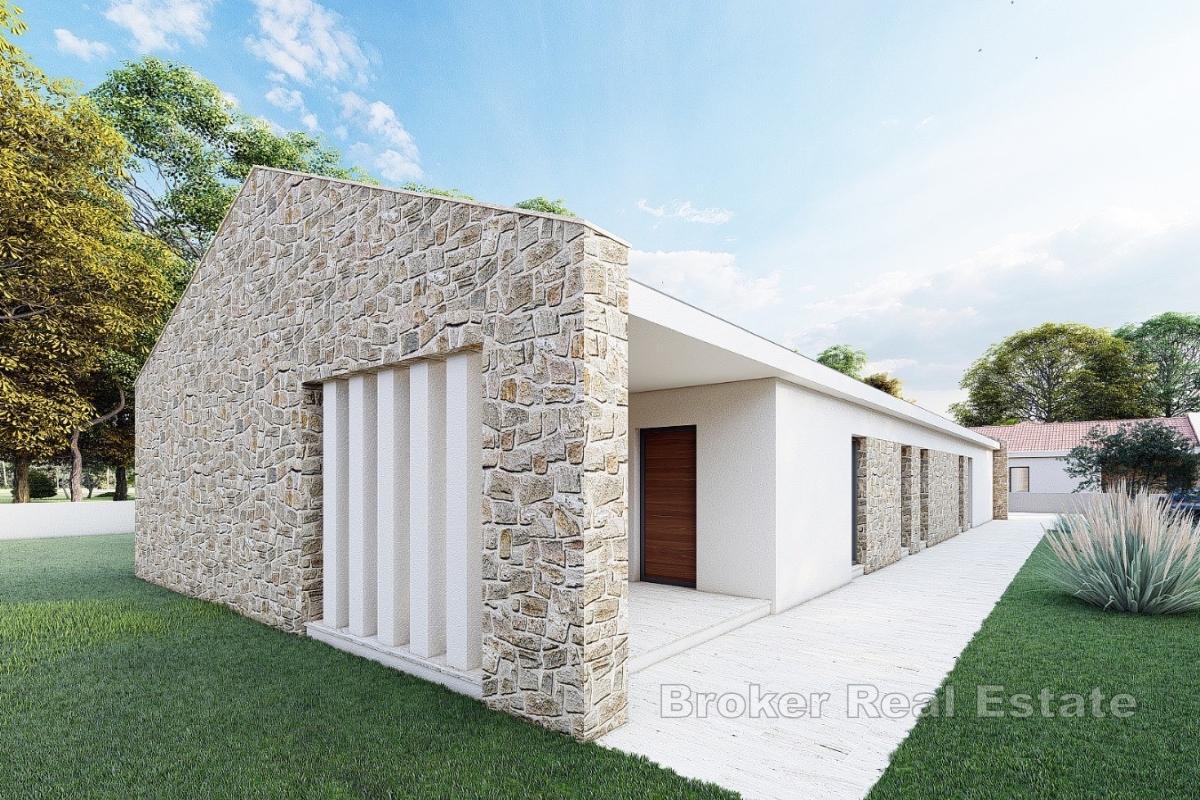 Několik stavebních pozemků s projekty vil