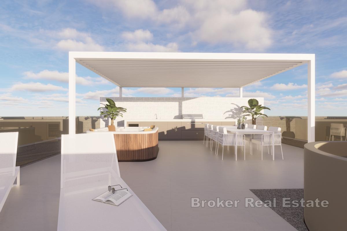 Résidence moderne avec piscine et vue mer